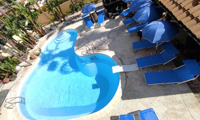 Villaggio Mose House | Top-Rated B&B Villa Colomba with Oceanfront Pool Access