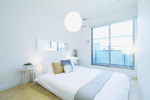 Hiroshima City Centre Apartment | Family-Friendly bHOTEL Ball Park: 2 Mins to Baseball Action