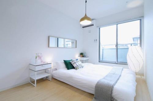 Hiroshima City Centre Apartment | Modern bHOTEL Ball Park: 2-Bedroom Apt Near Baseball Museum