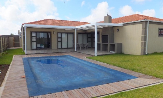 Port Elizabeth Villa | Explore B.R.O.Homes and Villas: Oceanfront Retreat with Pool