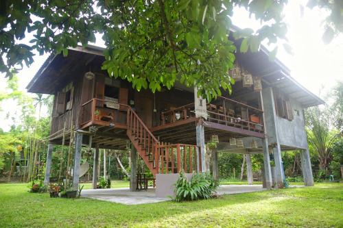 Chawang House | Top-Rated Bann Chi Homestay: Pet-Friendly & Family Welcome
