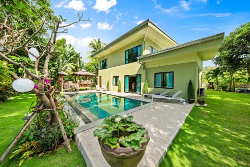 Thong Krut Villa | Experience Baan Suaan Serenity: Oceanfront Bliss Awaits