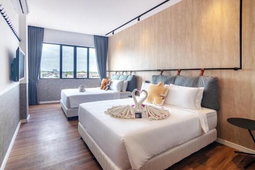 Kampung Simpah Hotel | Inviting Bagan Suite with Family-Friendly Amenities