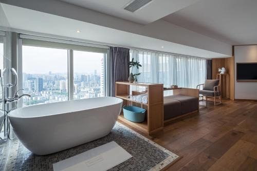 Jiang Bei Hotel | Experience Bai Yun Qin She Boutique: Family-Friendly Retreat