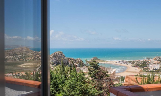 Licata Apartment | Experience Baia Del Sole: Top-Rated with Hot Tub & Fireplace