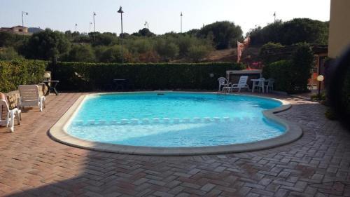 Murta Maria Apartment | Idyllic Baia Turchese A36 with Oceanfront Pool Access
