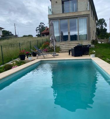 Baiona House | Relax in the Baiona Pool House with Family-Friendly Amenities