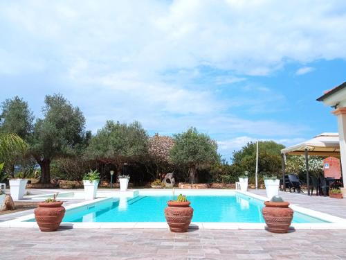 Torre di Bari Hotel | Pet-Friendly Baja Azzurra: Oceanfront Retreat with Pool
