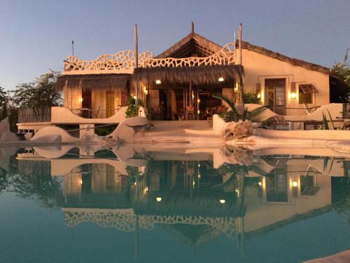Toliara Cabin | Experience Bakuba Lodge: Oceanfront Retreat with Pool