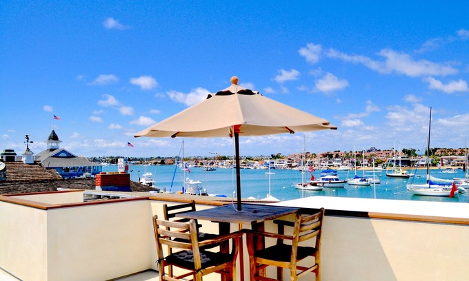 Balboa Peninsula House | Balboa Bay View: Steps to Beach with Oceanfront Amenities