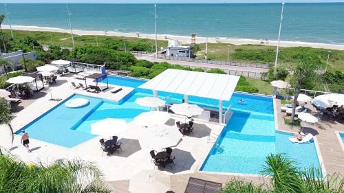 Itacolomi Apartment | Ideal Bali Beach Piçarras Resort with Oceanfront Pool