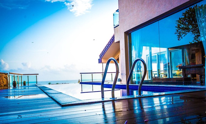 Reis Magos Villa | Serene Balinese Sea View Villa with Infinity Pool Retreat