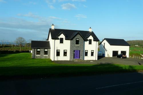 Ballygally Apartment | Top-Rated Meadow View Apartment with Family-Friendly Amenities