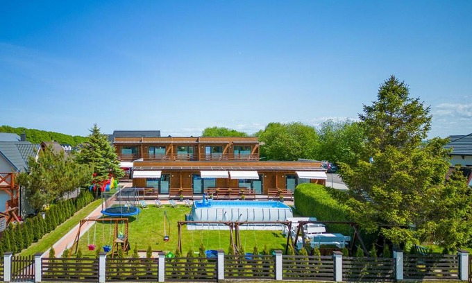 Mielno Cabin | Ocean View Haven at Baltic Resort - Rated 9/10 by Guests