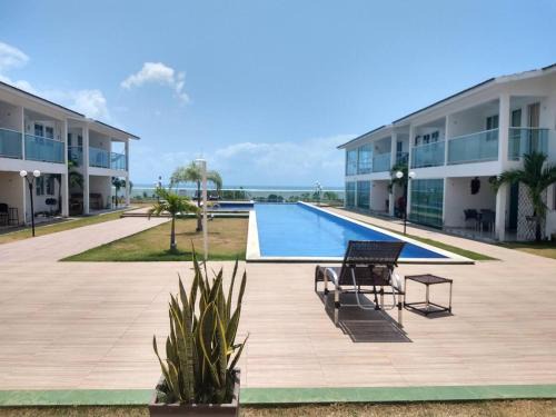 Village Jacuma Apartment | Duplex Bangalô 602: Oceanfront Retreat with Pool & Pet Friendly