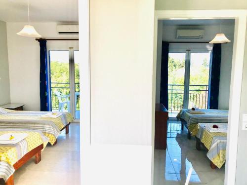 Roda Apartment | Guest Rated: Perfect Corfu Apartment with Pool Access