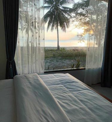 Lang Suan House | Discover บ้านระเบียงเลหลังสวน: Beachfront Haven for Families