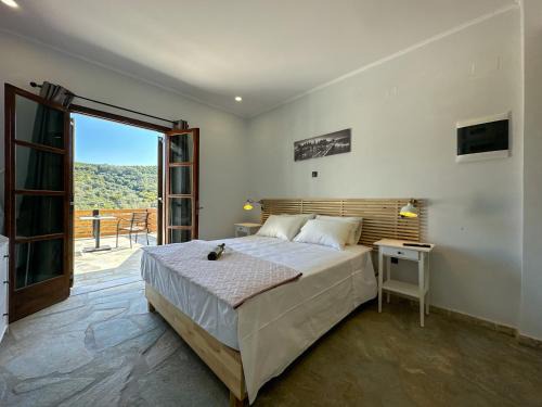 Doukades Apartment | Cozy Barbara House: Pet-Friendly with Hot Tub & High Rating
