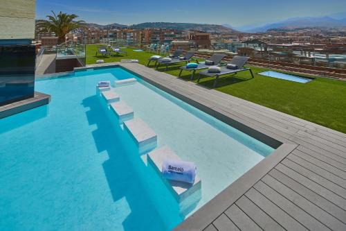 Figares Hotel | Elegant Barceló Granada Congress with Pool and Spa Access