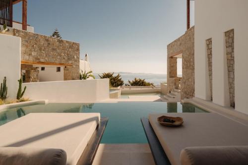 Agios Stefanos Hotel | Discover Bard De Sol: 4-Star Excellence with Pool & Dining
