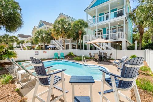 Surfside Beach House | Barefoot Beach- Steps to Beach Pool Pet Friendly
