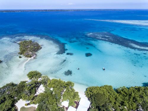 Saraotou Cabin | Escape to Barrier Beach Resort: Oceanfront Bliss Awaits