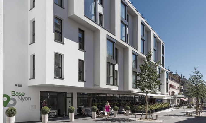 Nyon Apartment | Elegant Base Nyon: 4-Star Comfort with Spa & Dining