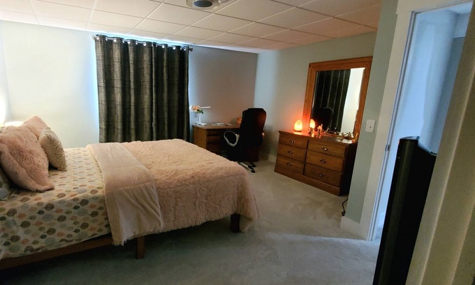 Williston North Condo | Cozy Basement Retreat with Theatre, Gym & Breakfast