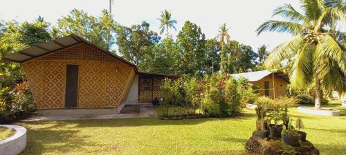 Mambajao House | Exceptional Bat Tree Cottages - Wheelchair Accessible Haven