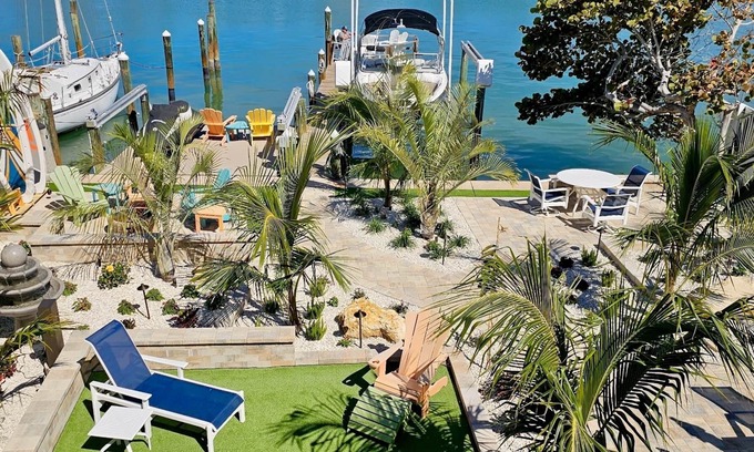 Treasure Island Apartment | Bayfront 2 Bedroom Retreat with Dock and Beach Access