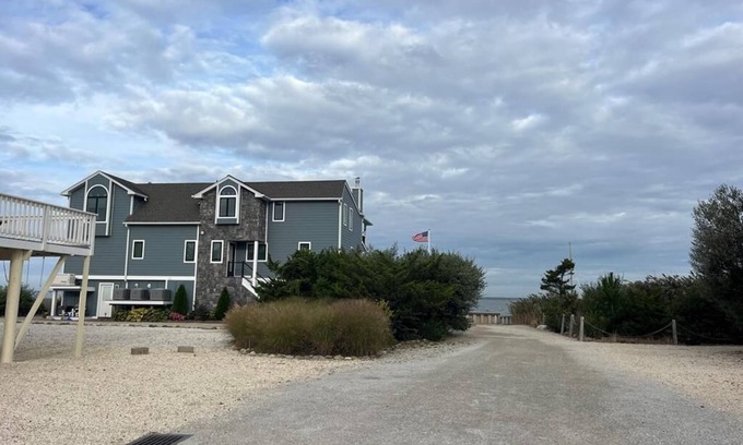 North Beach House | Relax at Bayfront North Beach with Pool & Spa Amenities
