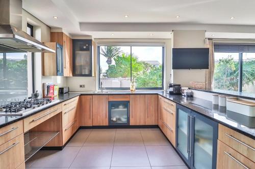 Sunset Beach House | Relaxing Retreat at Bayhill Terrace 17 with Pool Access