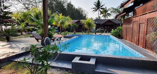Setiu House | Relax at Bayu Beach Penarek with Private Oceanfront Access
