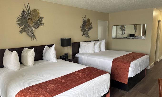 Trailer Estates Hotel | Bayview Waterfront Room with Pool, Tiki Bar & Grill Awaits
