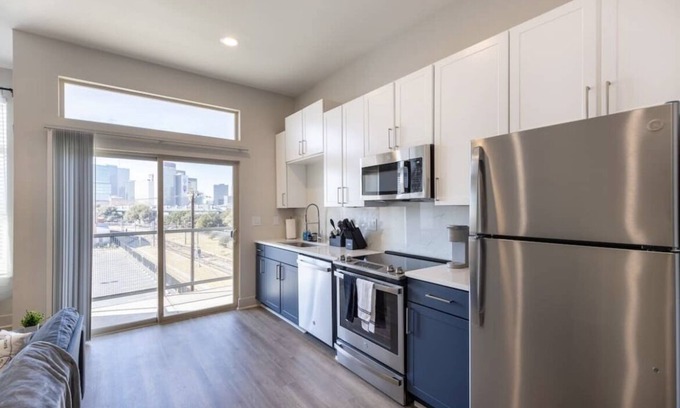 Deep Ellum Apartment | Be Yourself Stays: A Unique Haven with Spa and Hot Tub