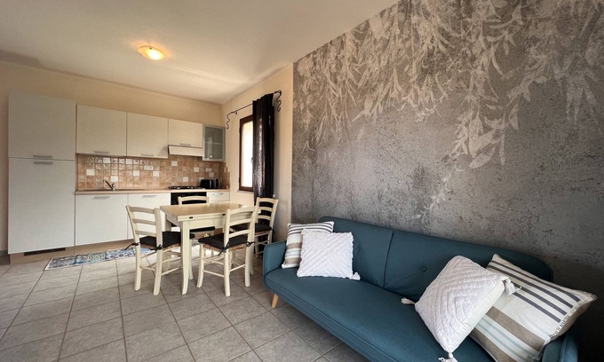 La Muddizza Apartment | Inviting Flat with Balcony, Parking & Family-Friendly Perks