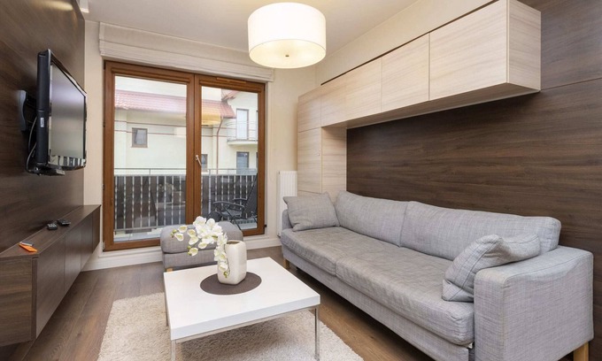 Karwia Apartment | Modern 1 Bedroom Retreat with Balcony and Pet-Friendly Perks