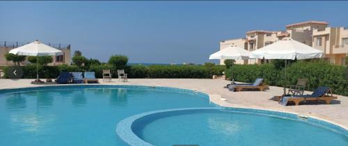 Ras Sudar Apartment | Beachfront Chalet with Pools in Ras Sudr - Rated 9.7/10