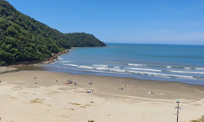Canto do Forte Apartment | Beachside Apartment with Ocean Views and Mountain Backdrop