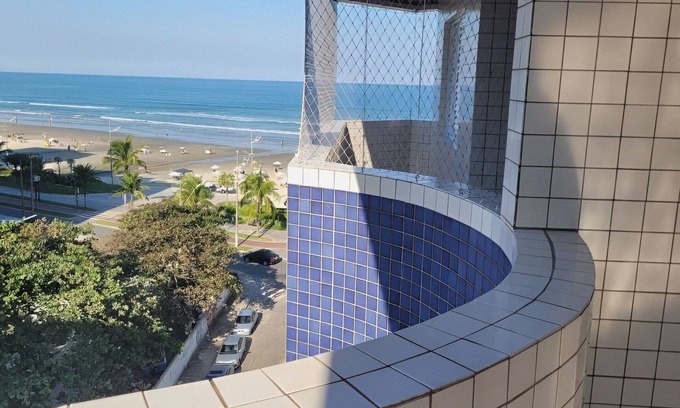 Caicara Apartment | Beachfront Apartment at Praia Grande with Pool and Ocean View