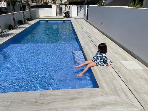 Santiago de la Ribera Apartment | Cozy Beach Bungalow with Pool and Oceanfront Terrace