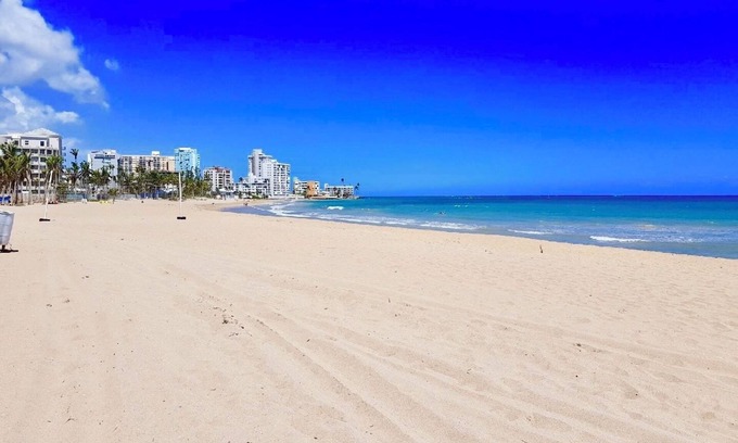 Isla Verde Apartment | Beach Cabaña: Oceanfront Retreat with Top Amenities