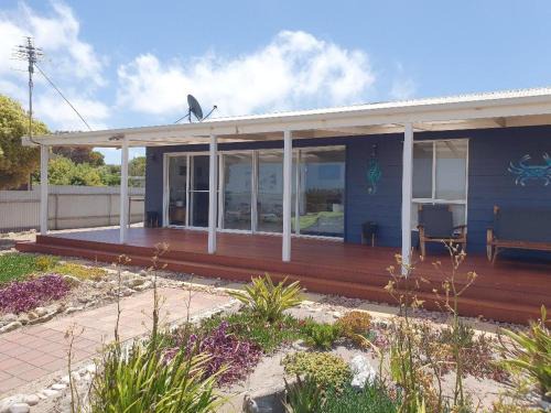 Melville House | Oceanfront Escape at Beach Front Blue with Breakfast Included