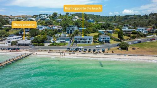 Maraetai House | Oceanfront Bliss: Beach Front Resort with 9.3/10 Rating