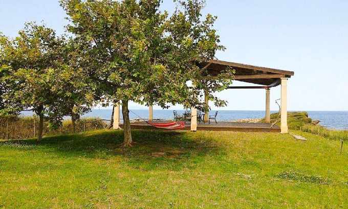Pyrgos Apartment | Oceanfront Two-Bedroom Apartment with Breakfast Included