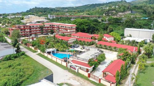 Garapan Apartment | Beach Garden Hotel: Oceanfront Stay with Pool & Breakfast