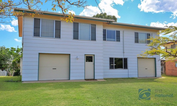 Woodgate House | Beach House Escape! Highset holiday Home one street from the Beach.