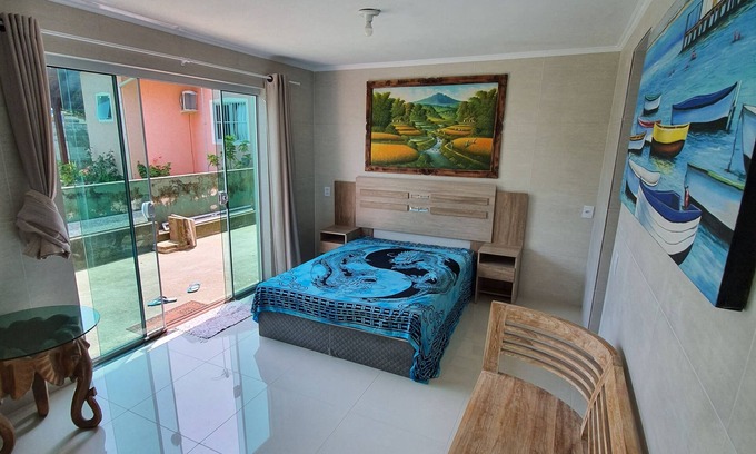 Palhoca House | Seafront Beach House with Kitchen Amenities for Your Getaway