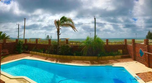 Beresford House | Beachfront Home with Pool and Ocean View for Families