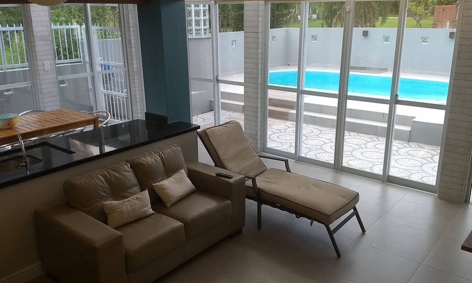 Daniela House | Beach House Retreat: Pool, Playground & Steps to the Ocean
